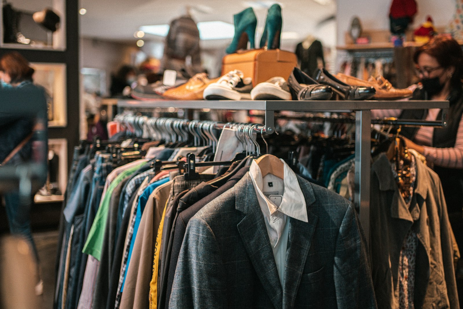 Racks of clothing and accessories in a retail store